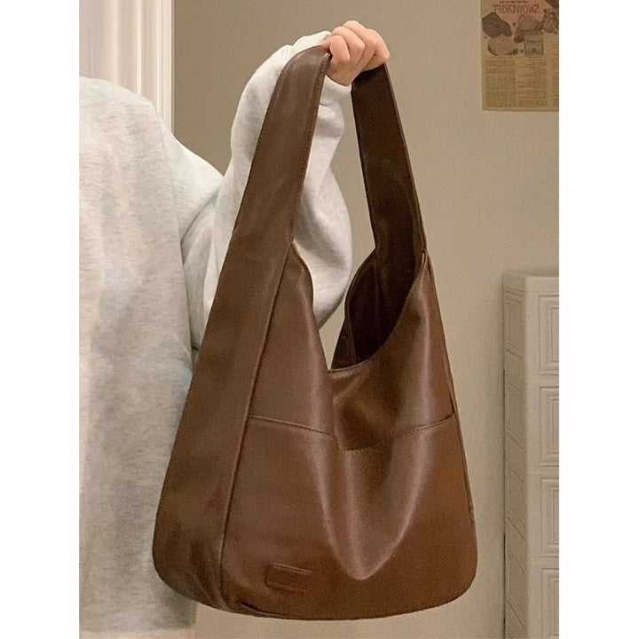 Damen Hobo-Tasche mit modernem, geschwungenem Design und schadstofffreiem Kunstleder Nord Taschen