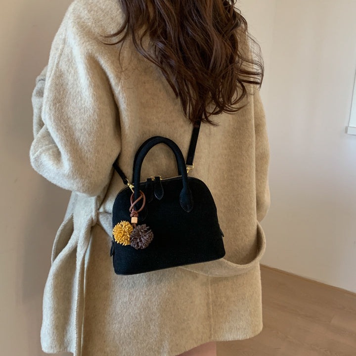 Damen Handtasche mit eleganten Quasten Nord Taschen