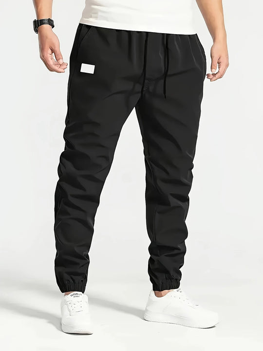 Herren Slim‑Tapered Tech‑Joggerhose mit Tunnelzugbund, elastischen Knöchelbündchen und funktionalen Seitentaschen Nord Taschen