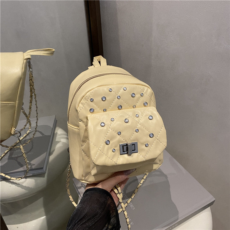 Damen Mini-Rucksackhandtasche mit eleganter Steppung und funkelnden Akzenten Nord Taschen