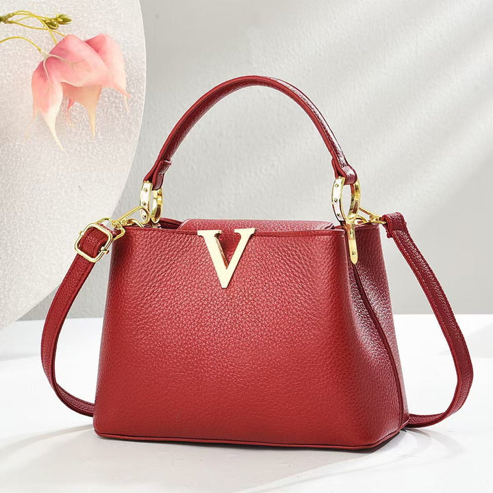 Damen stilvolle Handtasche mit goldenen Akzenten und verstellbarem Schulterriemen Nord Taschen