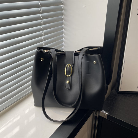Damen elegante Handtasche mit goldenen Akzenten Nord Taschen