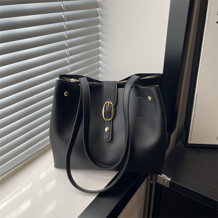 Damen elegante Handtasche mit goldenen Akzenten Nord Taschen