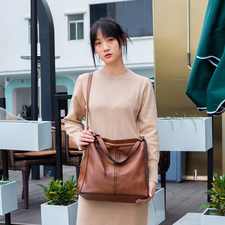Damen Hobo-Tasche mit elegantem Faltendesign und verstellbarem Schulterriemen Nord Taschen