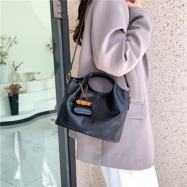 Damen elegante Handtasche mit abnehmbarem Charm Nord Taschen