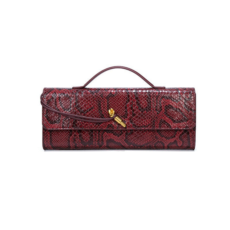 Damen Clutch mit schimmerndem Schlangenhautmuster Nord Taschen