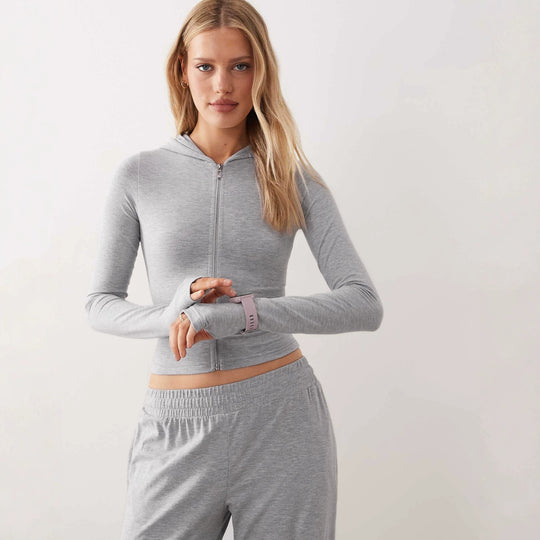 Damen Zweiteiliges Loungewear-Set geripptes Crop-Kapuzenoberteil mit Reißverschluss und Daumenloch sowie weiter Jogginghose Nord Taschen