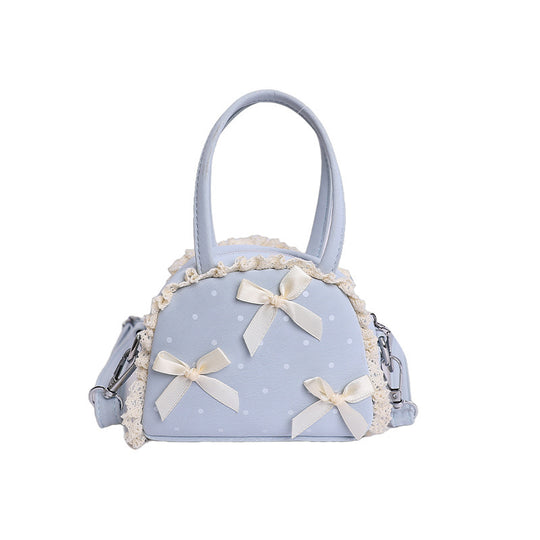 Damen modische Handtasche im verspielt romantischen Design mit Schleifenakzenten Nord Taschen