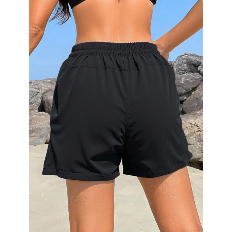 Damen Sportliche Badeshorts mit elastischem Bund und praktischen Taschen