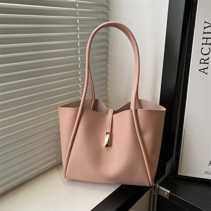 Damen elegante Tragetasche mit goldenen Akzenten Nord Taschen