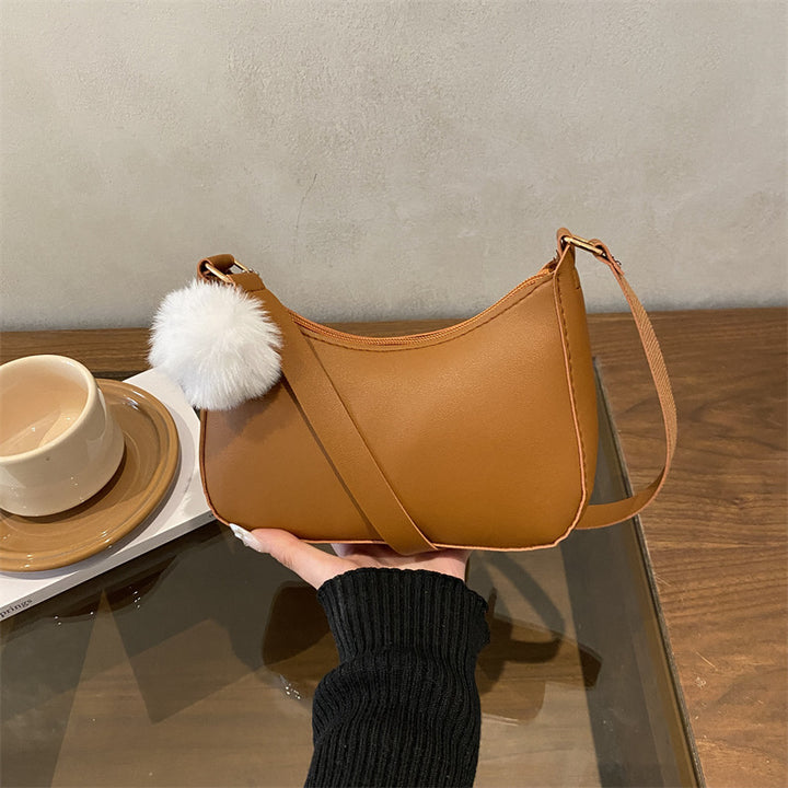 Damen Handtasche aus hochwertigem Kunstleder mit abnehmbarem Kunstfell