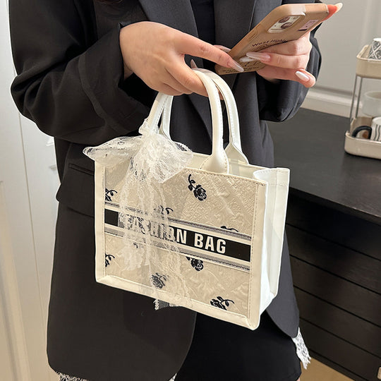Damen modische Umhängetasche mit floralem Relief und verspieltem Schleifendetail Nord Taschen