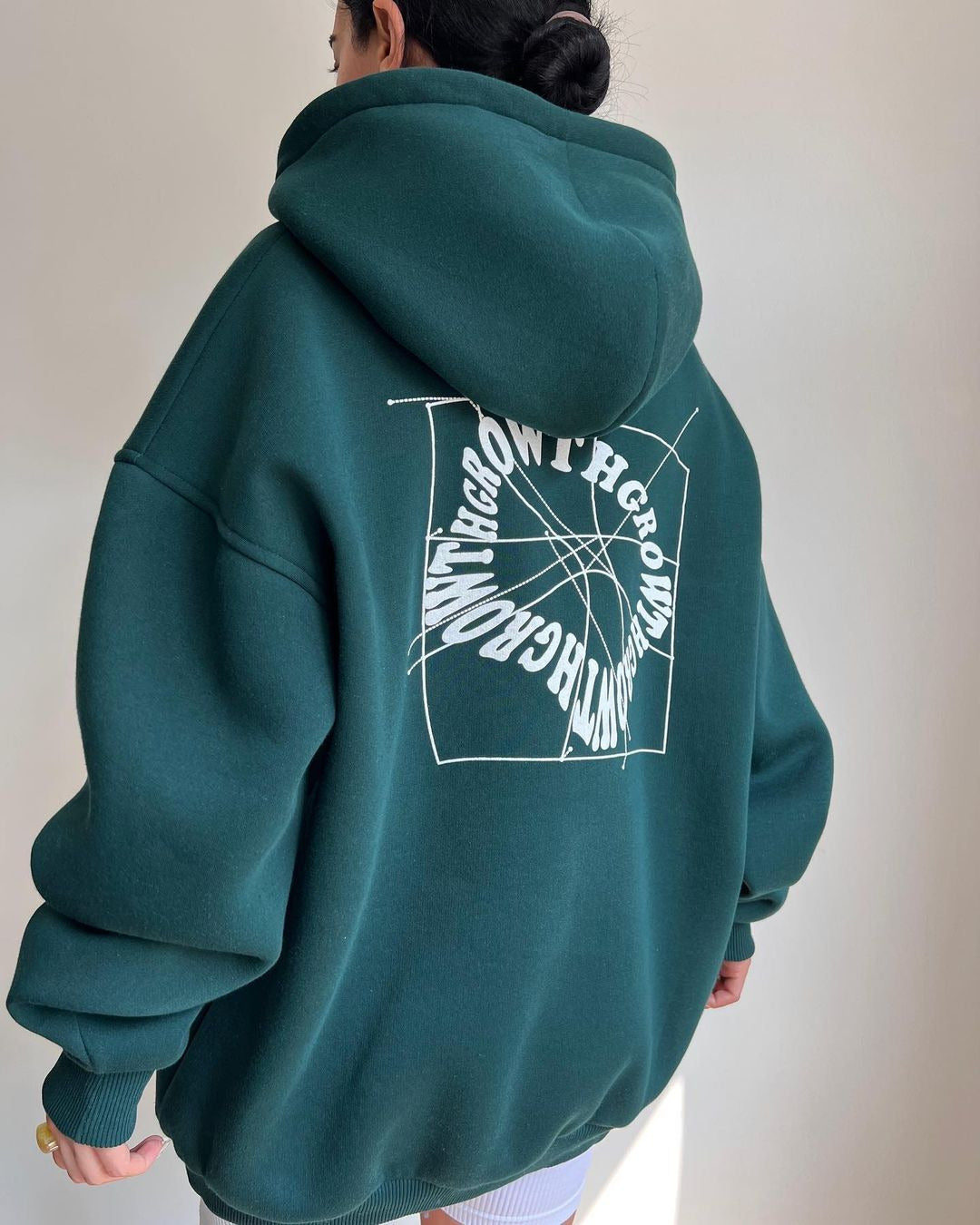 Damen Oversized Kapuzenpullover mit abstraktem Rückenprint und gerippten Bündchen Nord Taschen