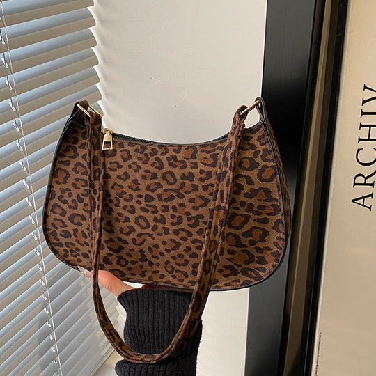 Damen Umhängetasche mit trendigem Leopardenmuster und elegantem goldenen Verschluss Nord Taschen