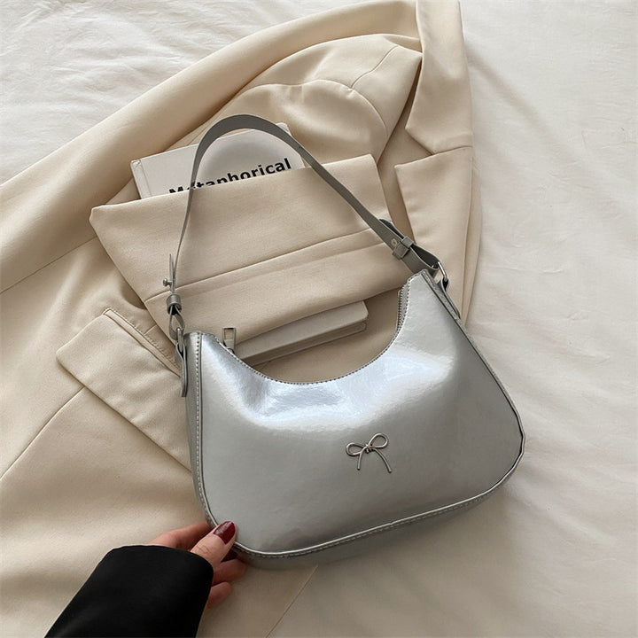 Damen Hobo-Tasche aus glänzendem Kunstleder mit dekorativem Schleifendetail Nord Taschen