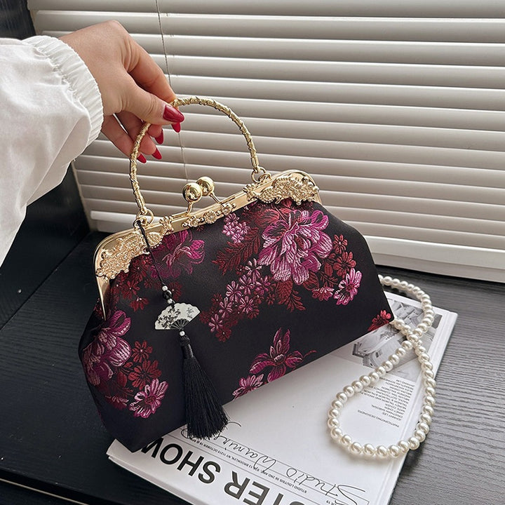 Damen elegante Umhängetasche mit floralem Design und goldenen Akzenten Nord Taschen