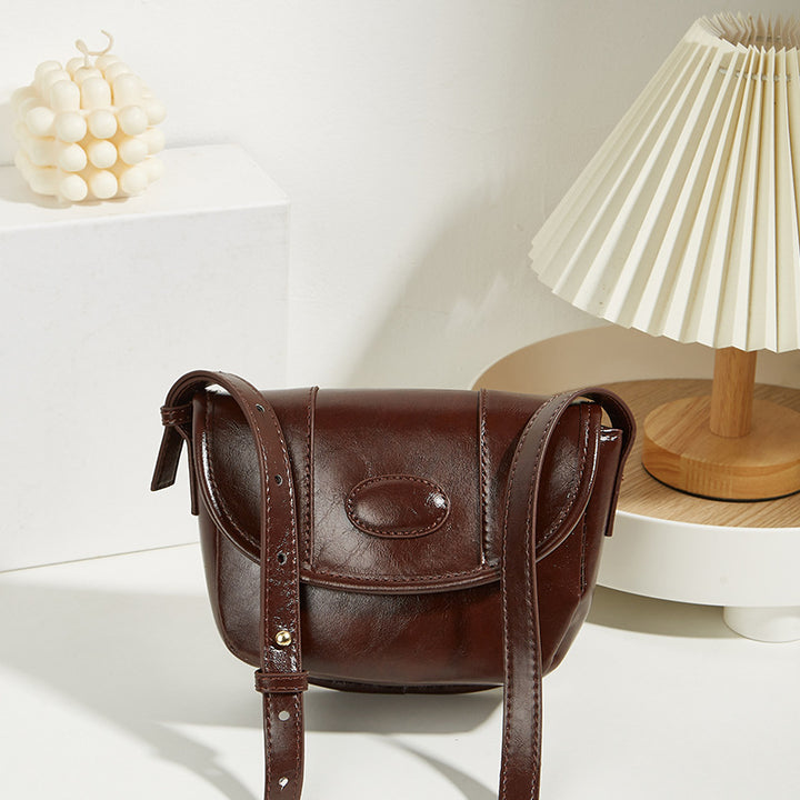 Damen Umhängetasche aus hochwertigem Kunstleder mit klassischer Klappenöffnung Nord Taschen