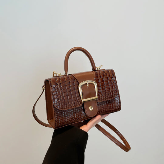 Damen Umhängetasche aus strukturiertem Krokodilleder mit eleganter Schnallenverzierung Nord Taschen