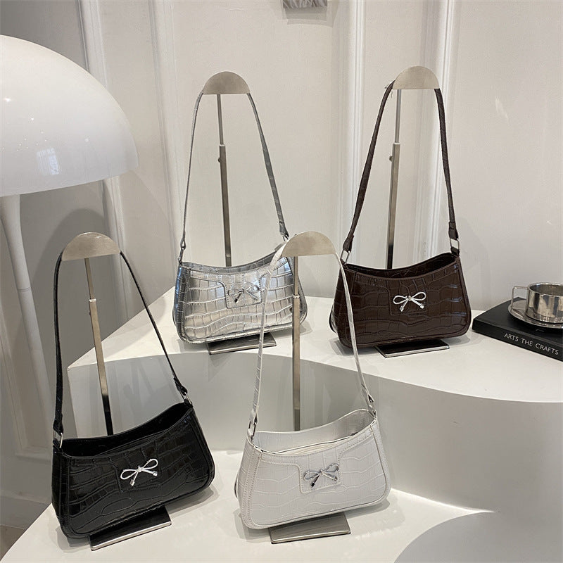 Damen elegante Handtasche mit Krokodilprägung und Schleifendetail Nord Taschen