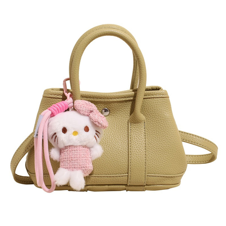 Damen Mini-Handtasche mit verspieltem Plüsch-Anhänger Nord Taschen