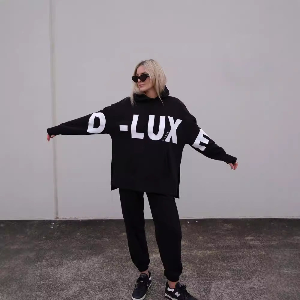 Damen Oversized Kapuzenpullover mit markantem Logoprint, Kängurutasche und Seitenschlitzen Nord Taschen