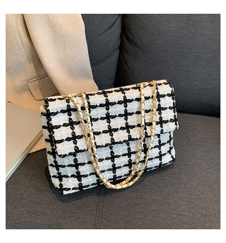 Damen Clutch-Tasche im zeitgenössischen Design mit strukturiertem Muster Nord Taschen