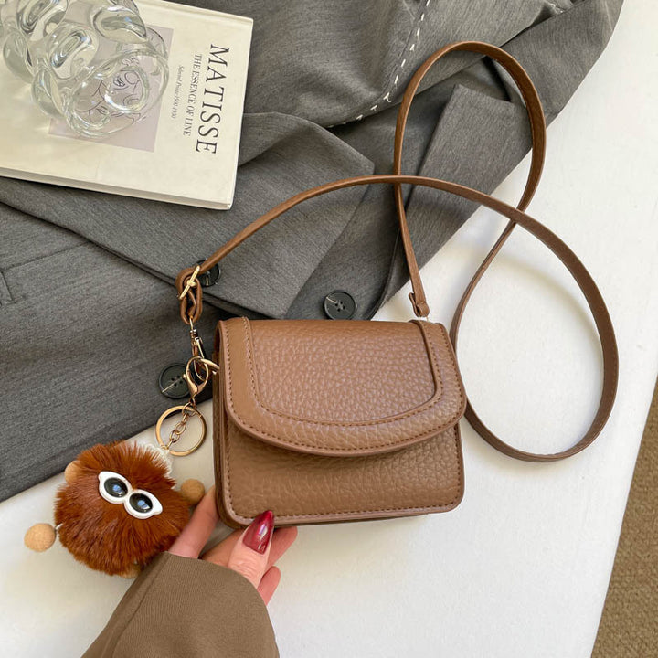 Damen praktische Mini-Umhängetasche mit verspieltem Anhänger Nord Taschen