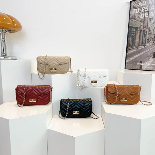 Damen modische Umhängetasche mit eleganter Steppstruktur und hochwertigem Metallverschluss Nord Taschen