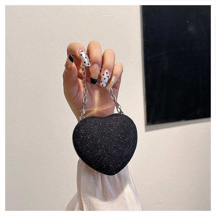 Damen Clutch im Herzen-Design mit eleganter Glitzer-Oberfläche Nord Taschen
