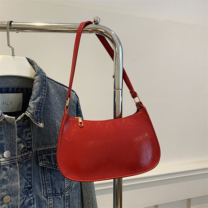Damen elegante Umhängetasche aus veganem Leder mit minimalistischer Form Nord Taschen