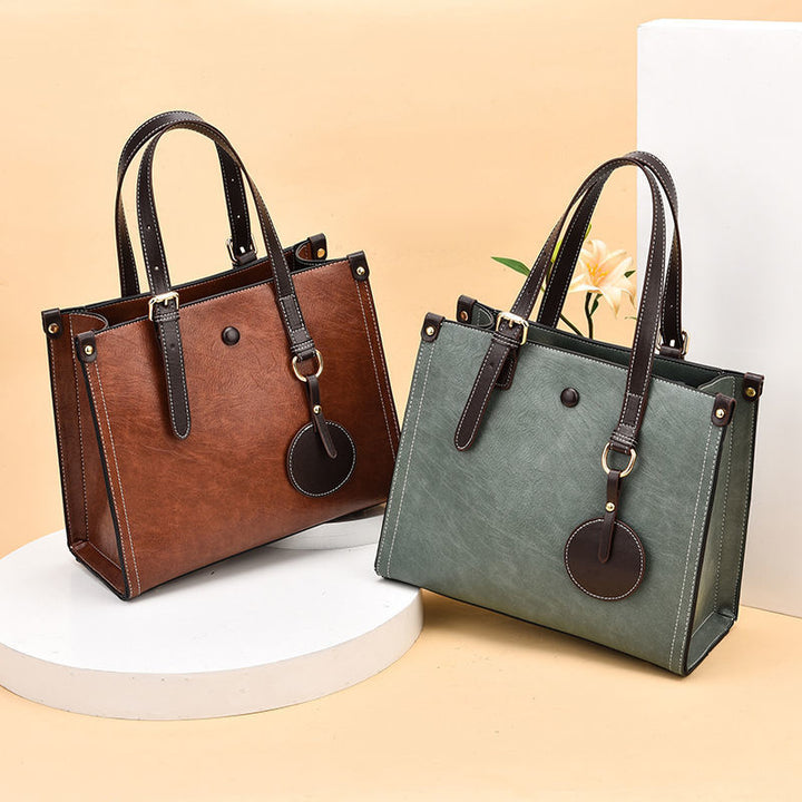 Damen elegante Henkeltasche mit abnehmbarem Schultergurt und strukturiertem Design Nord Taschen