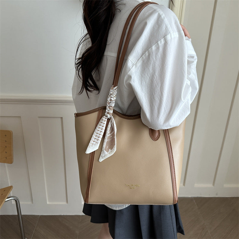 Damen elegante Handtasche mit modischem Schalszierring Nord Taschen
