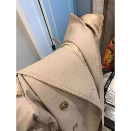 Damen Eleganter Midi-Trenchcoat mit Oversize-Schulterklappe, gerafften Ärmeln und taillierendem Bindegürtel Nord Taschen