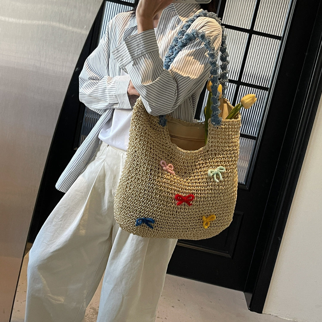Damen Strandtasche aus handgewebtem Naturmaterial mit gestreiften Griffen Nord Taschen