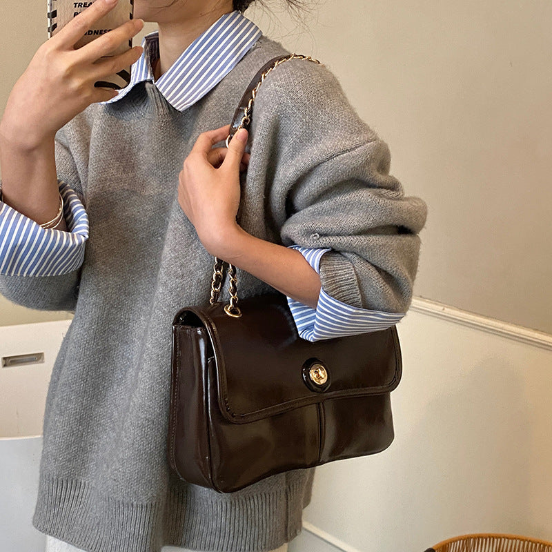Damen elegante Handtasche mit schickem Kettenverschluss Nord Taschen