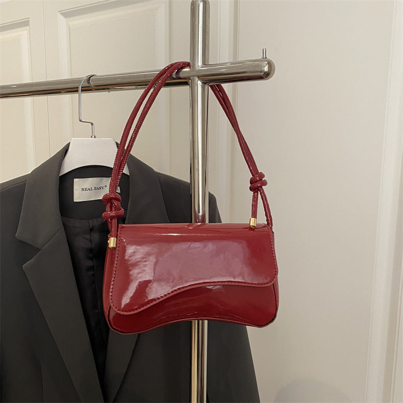 Damen elegante Handtasche mit geschwungenem Design Nord Taschen