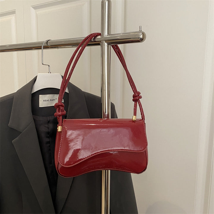 Damen elegante Handtasche mit geschwungenem Design Nord Taschen