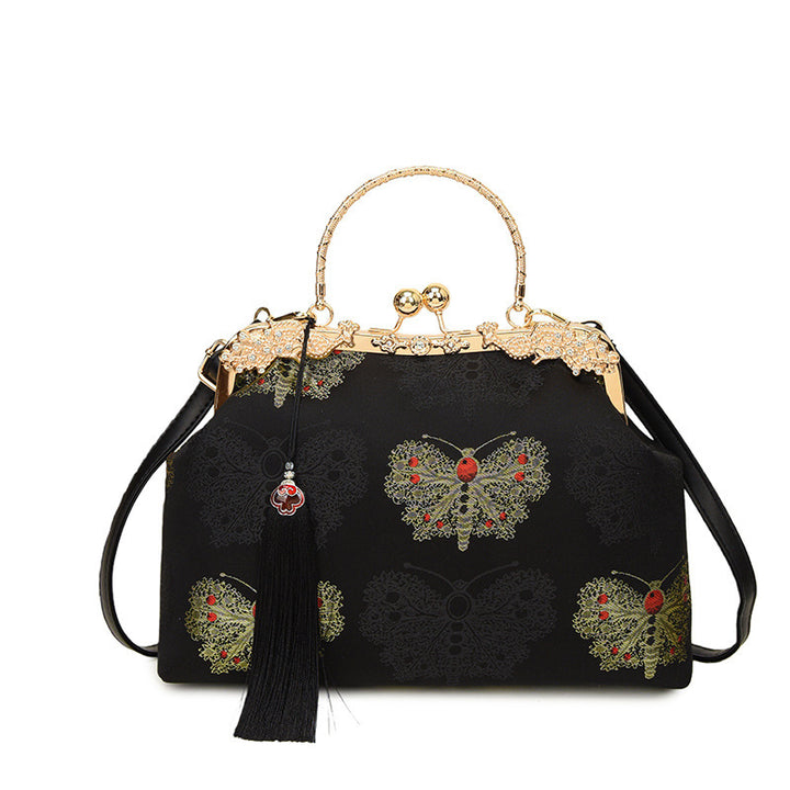 Damen modische Handtasche mit filigranem Schmetterlingsmuster und eleganten Akzenten Nord Taschen