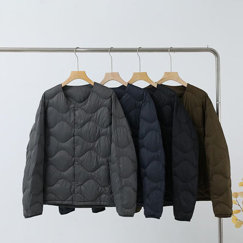Damen Ärmellose Thermo‑Steppweste mit wellenförmiger Steppung und Druckknopfverschluss Nord Taschen