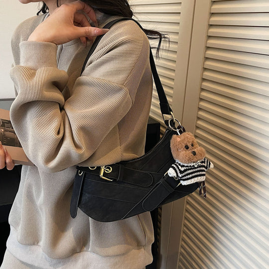 Damen Umhängetasche mit verspieltem Tieranhänger und elegantem Design Nord Taschen