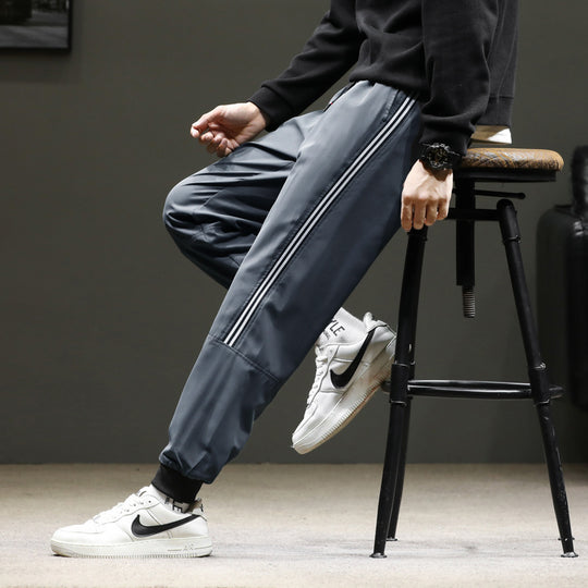 Herren Sportive Jogginghose im Trackstyle mit seitlichen Kontraststreifen, Tunnelzug und elastischen Bündchen Nord Taschen