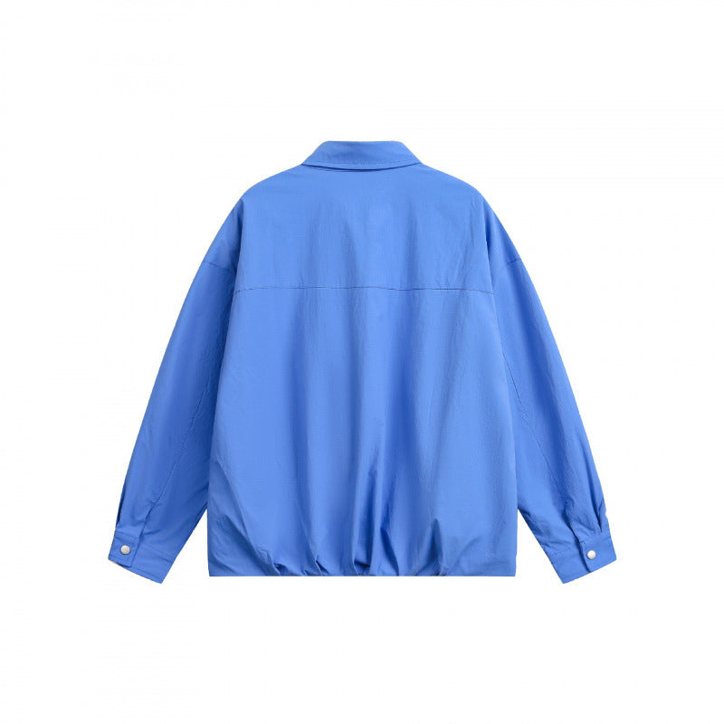 Unisex Boxy-Hemdjacke mit Druckknopfleiste, Hemdkragen und elastischem Saum Nord Taschen