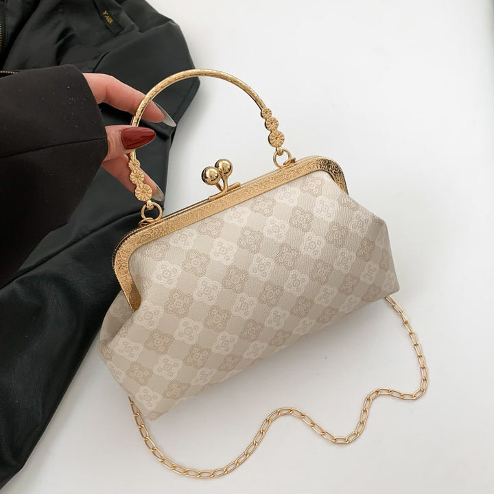 Damen-Clutch mit elegantem Blütenmuster und verziertem Kettenverschluss Nord Taschen