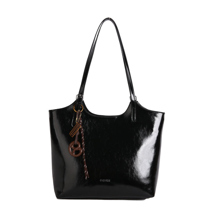 Damen elegante Tote-Handtasche aus hochwertigem Kunstleder mit verspieltem Anhänger Nord Taschen