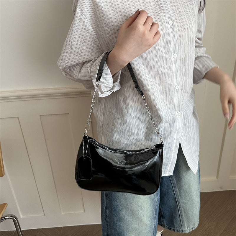 Damen elegante Umhängetasche mit glänzender Lackoberfläche Nord Taschen