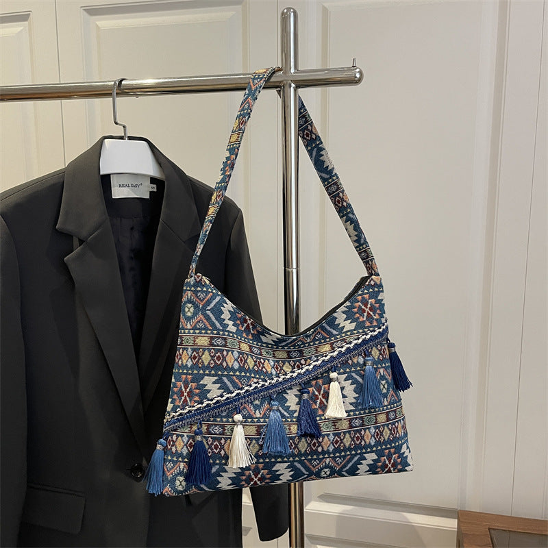 Damen trendige Umhängetasche mit farbenfrohem Muster und Fransen Nord Taschen