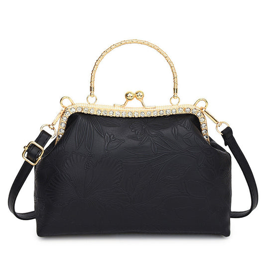 Damen elegante Handtasche mit floralem Relief und goldenen Akzenten Nord Taschen