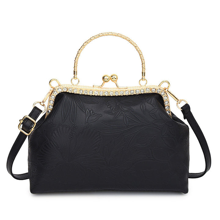 Damen elegante Handtasche mit floralem Relief und goldenen Akzenten Nord Taschen