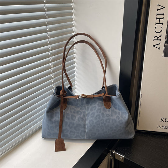 Damen elegante Umhängetasche mit animalischem Muster und praktischen Details Nord Taschen