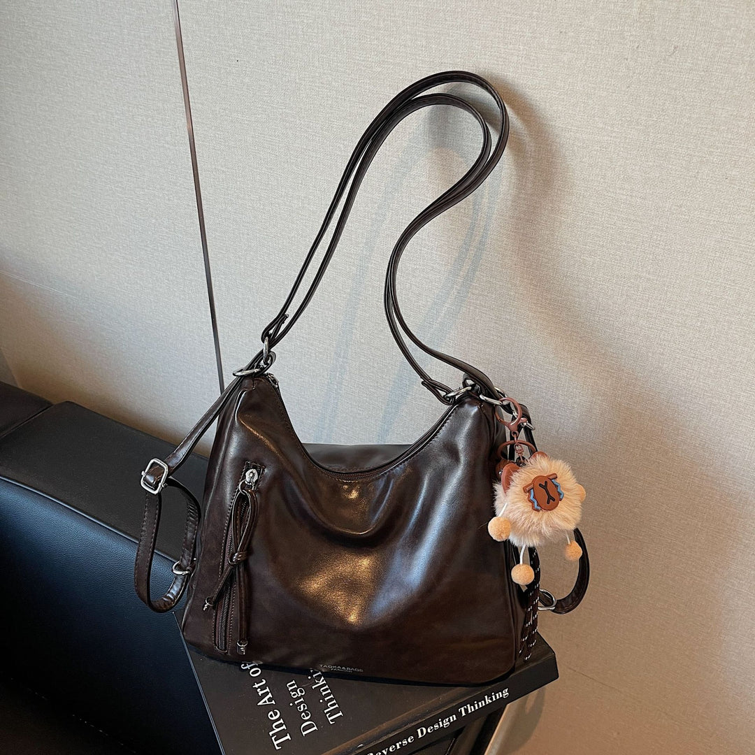 Damen praktische Handtasche mit verspieltem Anhänger Nord Taschen